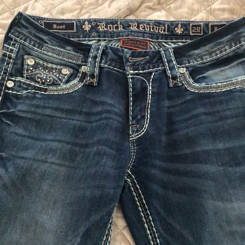 Rock Revival “Raylea” medium blue jeans.